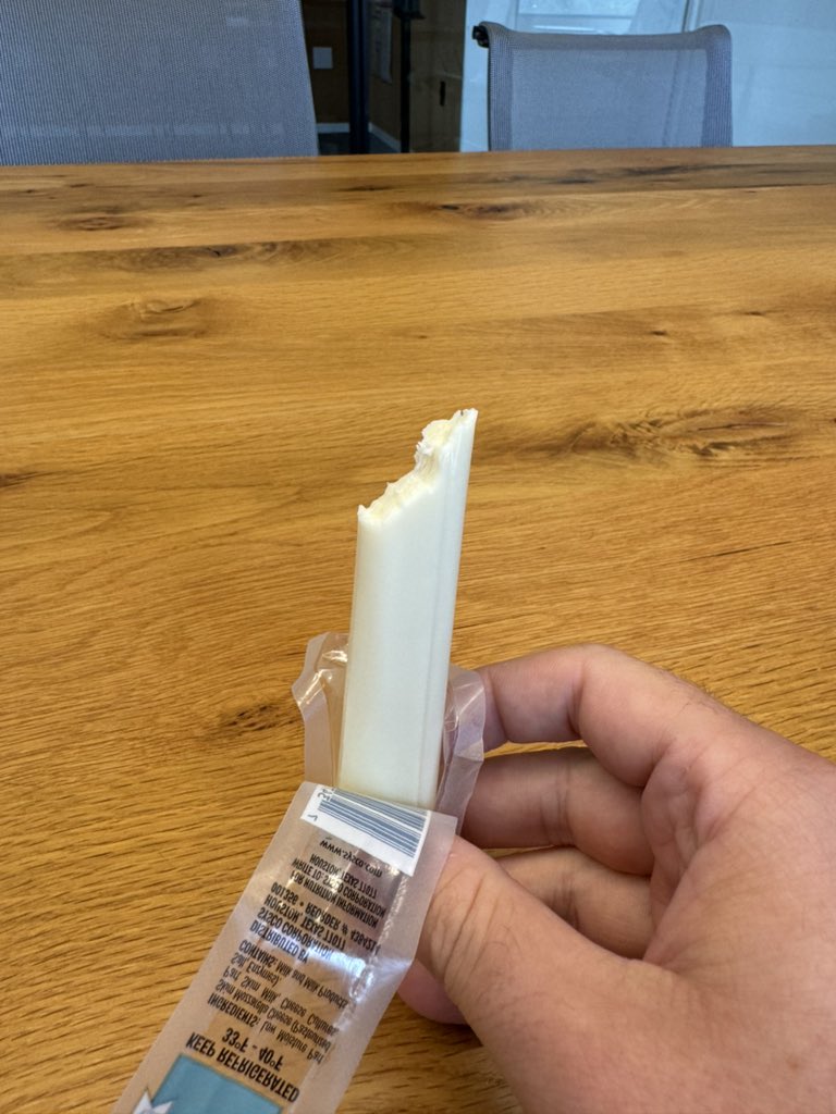 The correct way to eat a string cheese stick