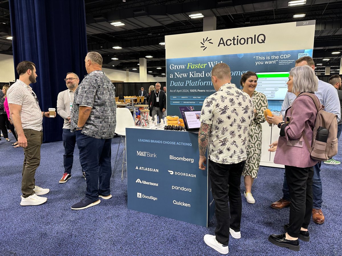 ActionIQinc's tweet photo. We're still all #CDPs and #donutsondonuts over at the ActionIQ booth today at #GartnerMKTG day two! Stop by, grab a quick bite for energy on the expo floor, and chat with our team about how a Composable CDP helps leading brands grow faster. It might just change your life 🍩 https://t.co/xVqiV4eLOX