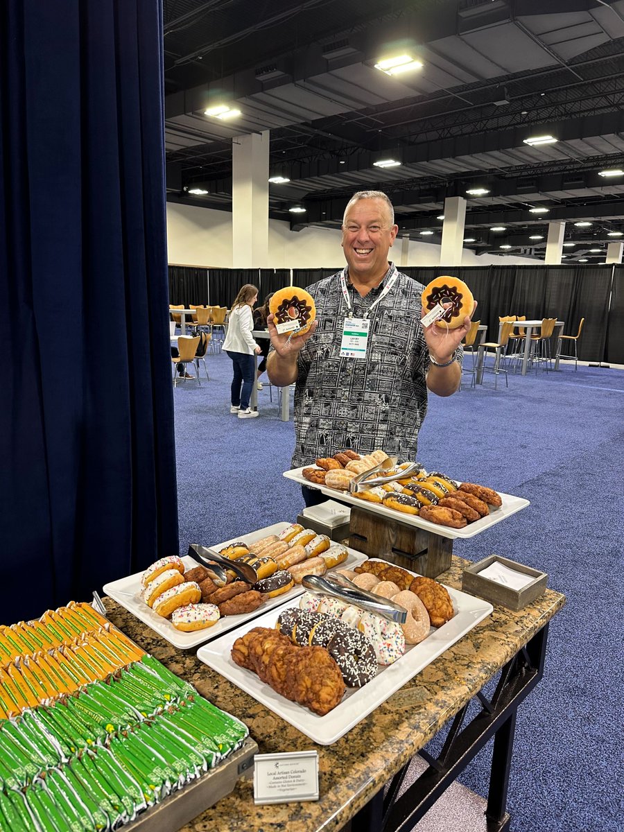 ActionIQinc's tweet photo. We're still all #CDPs and #donutsondonuts over at the ActionIQ booth today at #GartnerMKTG day two! Stop by, grab a quick bite for energy on the expo floor, and chat with our team about how a Composable CDP helps leading brands grow faster. It might just change your life 🍩 https://t.co/xVqiV4eLOX