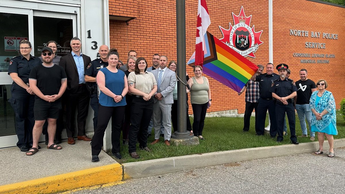 DeputyChiefDaze's tweet photo. @NorthBayPolice celebrating pride month with the raising of the flag. @DarylLongworth https://t.co/VaxR8c4ILy
