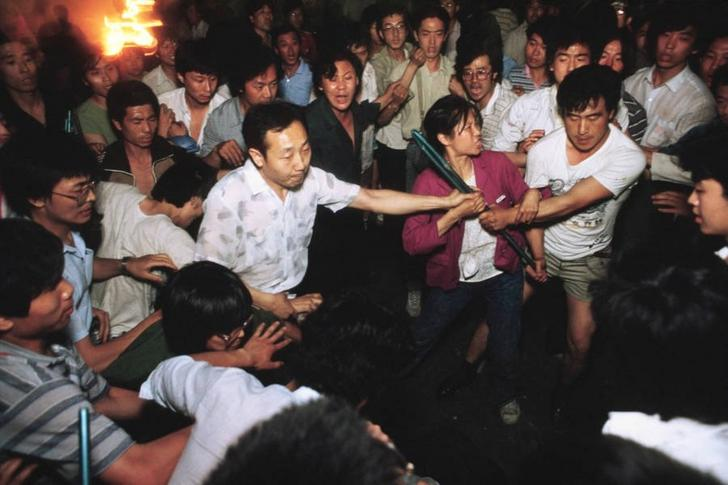OliverJia1014's tweet photo. Long post, but please share. Today marks the 35th anniversary of the Tiananmen Square student protests and the bloody massacre carried out by the Chinese Communist Party.

There were some truly horrific images taken on June 4, 1989, but it's actually quite difficult to find them using a conventional Google search.

This could be due to CCP pressure, but more likely it's probably because Google algorithms in the last few years have intentionally tried to suppress graphic images and provide a sanitized internet experience for its users. You will face similar problems when looking up images related to events like 9/11 or the 2014 shoot-down of Malaysia Airlines Flight 17.

An unknown number of people were killed and wounded at Tiananmen, but it was assuredly in the thousands. I believe it to be an insult to their memories for what they went through to be censored or hidden.

The link at the end of this tweet is an archived Imgur page containing many rare photographs hardly ever run by Western news outlets because of their graphic nature.

I have chosen less graphic images to include in this tweet out of concern for my more sensitive followers, so please click the link for more photographs. Be warned that the externally linked ones are very explicit images of bashed skulls, dead bodies, and people burned alive, among other terrible things.

It is not content that I enjoy sharing, but it must be seen by the world and younger generations. Countless journalists risked their lives in taking these photographs and smuggling them out of China. Yet their work is not seen nearly widely enough. This is history and it must be preserved.

The CCP do not want you to see these photographs nor do they want you to know what the Tiananmen protests were. Young Chinese are raised to be intentionally ignorant to what they were. As Hong Kong has been taken over by the CCP, in due time young people in what was once a free, vibrant, pluralistic, and democratic society will not know what Tiananmen was either.

As people living on the outside though, we owe it to all those who were killed, imprisoned, and crippled for life during these protests for freedom to remember what these brave souls fought for, even if it was ultimately in vain.

Those who follow me know that my Chinese relatives survived Mao Zedong's Cultural Revolution. I've been a staunch anti-communist and long-time opponent of the CCP. But you do not need my background to acknowledge that modern China is one of the least free and most authoritarian countries on earth.

Thanks to the Emergency Chinese Immigration Relief Act of 1989 in response to the Tiananmen massacre, the U.S. government allowed my Chinese aunt and uncle to stay in the United States, expediting the process which eventually allowed them to become American citizens.

In the last years of his life before he passed away in 2021, my father, who also became an American, was always critical of the CCP and angry at how much China had regressed since the Cultural Revolution instead of the promising post-Cold War direction most in the West hoped it would go in.

Today, I am profoundly grateful for living a life of freedom and happiness in Japan. I would not be here if weren't for how hard my father worked to leave China and have a successful life as a professional violinist in the West.

On this day, I remember my father and all the protestors of Tiananmen. Thank you for reading.
https://t.co/MrqumbZaeg