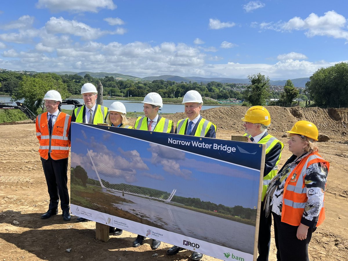 vincekearney's tweet photo. Taoiseach Simon Harris, Tanaiste Micheal Martin, Minister of State Malcolm Noonan + NI’s infrastructure minister John O’Dowd at site of work for Narrow Water Bridge to link counties Louth and Down. Due to open 2027, Irish Govt footing full cost of €106m @rtenews @LauraHoganTV https://t.co/mTxe9Yl2Af