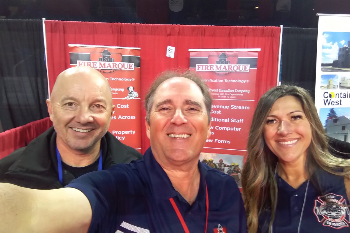 MarqueFire's tweet photo. #TNRD, Thompson Nicolai Regional District, Fire Chief and EMC Jason Tomlin and Fire Services Coordinator Janice Winger stopped by for a visit in Kamloops BC for the #FCABC Trade Show. Chris Carrier our National Accounts Manager was there to greet them. #FireMarque @MarqueFire https://t.co/mFdrTEHwPC