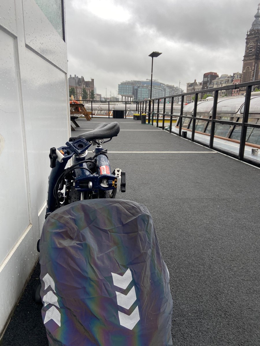 kript's tweet photo. @minaal field test of the new daily rain cover in Amsterdam went well! https://t.co/LmPR3kaC9X