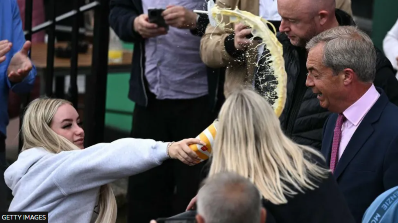 timothybuxton's tweet photo. Is it just me or is anyone else wondering if she won a @McDonalds prize 

#surprize
#milkshake
#nigelfarage https://t.co/ZPKfMvrege