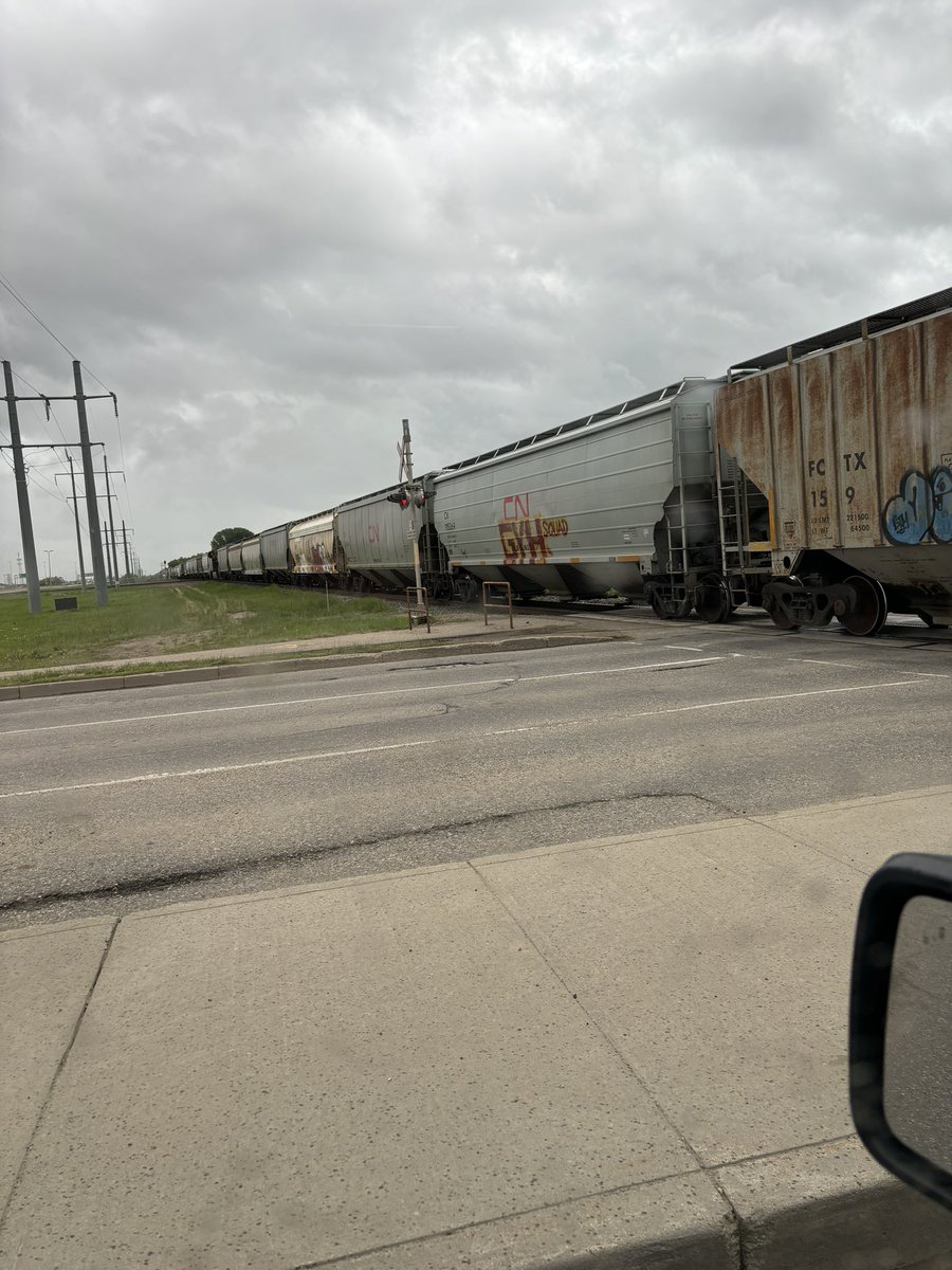 cz7's tweet photo. @cityofsaskatoon @CNRailway Any chance we can take another look at moving rail outside of the city? It’s mid-afternoon, traffic has stopped for 20 minutes and the train, which has no end in site, just started moving again. https://t.co/4cL2BObreP