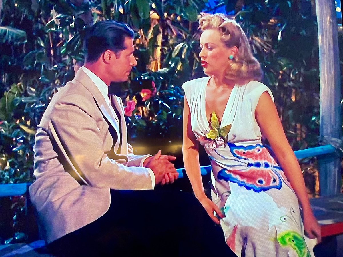 chrisreederATX's tweet photo. Her butterfly dress with butterfly pin.  Resort wear. #MoonOverMiami #TCMParty https://t.co/RF0EpSru9J