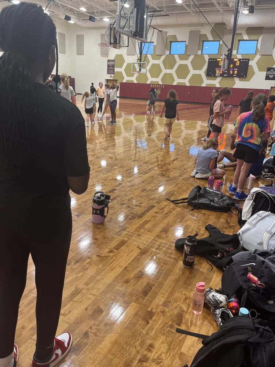 Coaching kids camp! So fun to teach kids how to play!