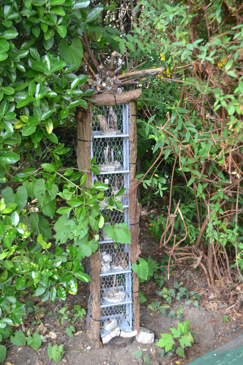 SchoolRowland's tweet photo. Its day 5 of #30dayswild. The children were hard at work making totem poles and bug hotels last half term. We are hoping the new additions to our front garden will attract lots of minibeasts! 🐛🦋🐜🐞 https://t.co/NkIiYmLMeA