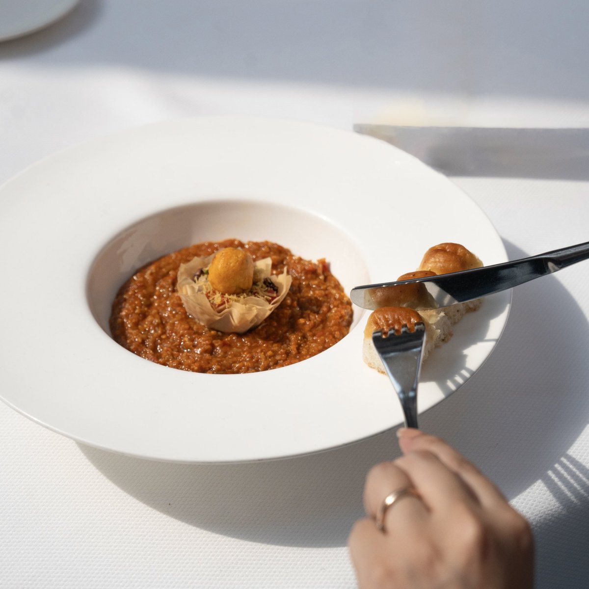 Indian_Accent's tweet photo. in focus: tempered ricotta vada, pao bhaji, kaffir lime butter pao or what we call our 'chowpatty in a bowl'
@chefmanishmehrotra's interpretation of the popular street food from mumbai's, chowpatty beach, an all year round hit in #delhi!
#indianaccent #inventiveindian #delhi https://t.co/6s9eFmmkm6