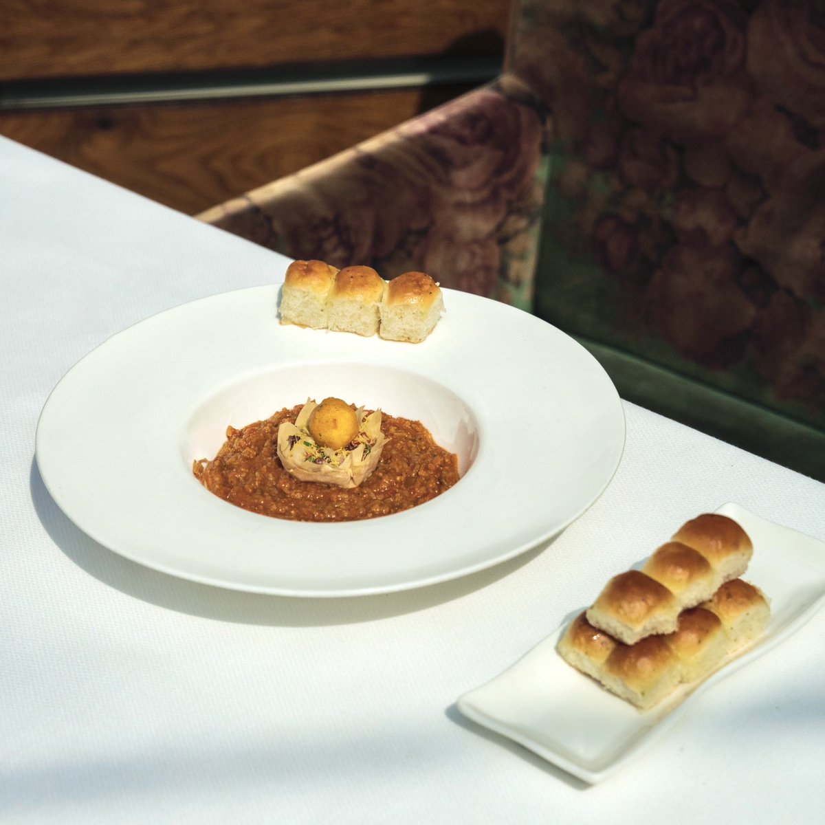 Indian_Accent's tweet photo. in focus: tempered ricotta vada, pao bhaji, kaffir lime butter pao or what we call our 'chowpatty in a bowl'
@chefmanishmehrotra's interpretation of the popular street food from mumbai's, chowpatty beach, an all year round hit in #delhi!
#indianaccent #inventiveindian #delhi https://t.co/6s9eFmmkm6