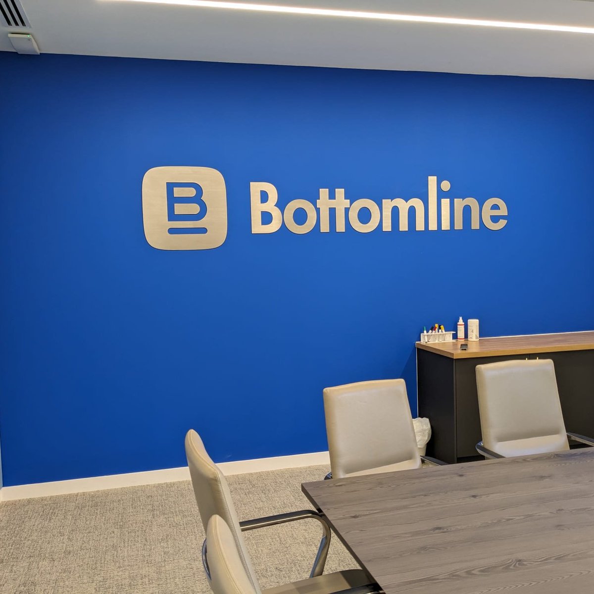 Custom stainless steel letters designed to your specific Corporate branding, installed by our inhouse installation team #featurewall #signagesuccess #signage #office #signmaking