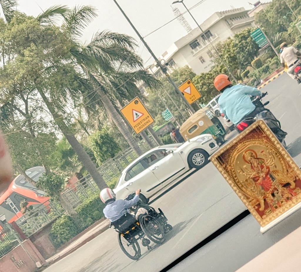 vermashik's tweet photo. Seeing this for first time, person on wheelchair wearing helmet. Full respect for this gentleman. This was outside #RailBhawan near #Parliament new building. He could be an example for those riding two wheelers without helmet and risking their lives. @dtptraffic @DelhiPolice https://t.co/G5Ghalam4B