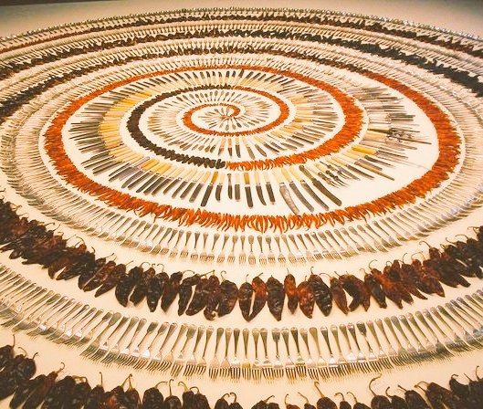 Singapore born artist of Indian descent, Simryn Gill, Forking Tongues, 1992, silver-plate cutlery and dried chilli peppers installation #WomensArt