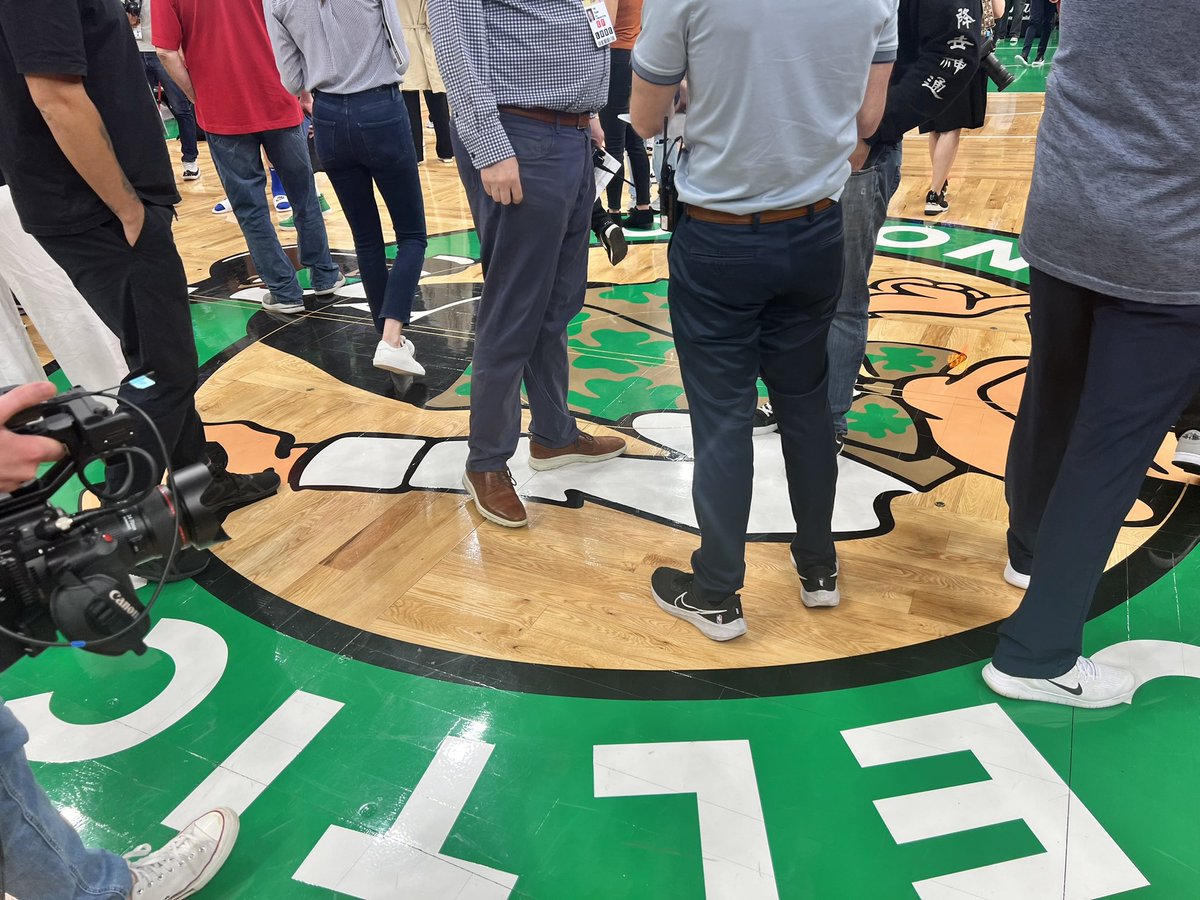 townbrad's tweet photo. All these reporters “stomping” on the logo. https://t.co/Zhay5HpdbH