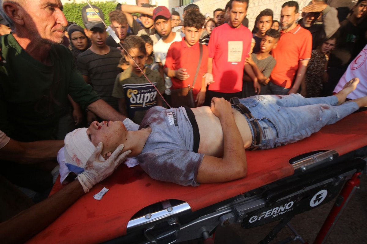 RamAbdu's tweet photo. Breaking: An Israeli drone bombed a group of children in the Zaytoun neighborhood east of Gaza, injuring at least 30 people, most of them children. https://t.co/1E94mCTsaS