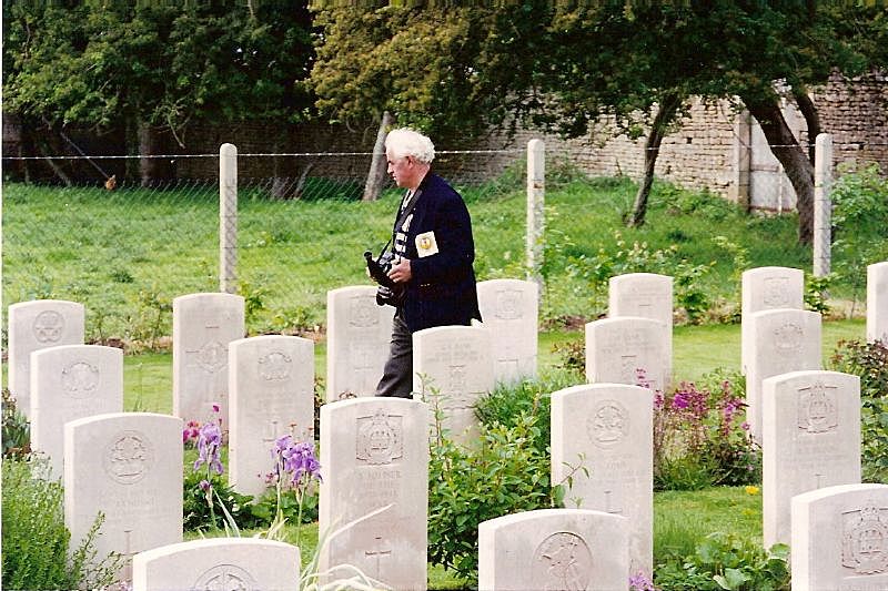 30 years ago I took my Dad to Normandy for the 50th anniversary of the D Day landings. After we'd toured the allied cemetaries, I told him we were going to a German one. Not bloody likely, he said. In the end he relented, and I took this picture of him. He was in tears.