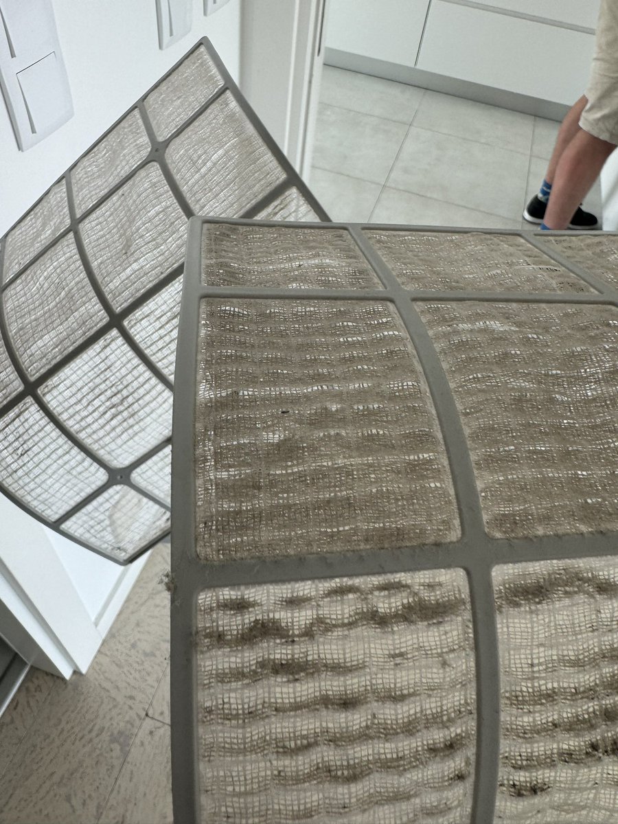levelsio's tweet photo. First thing I do now checking into a new Airbnb is open the aircon

Filters are always insanely dirty filled with dust, mould, and whatever is in there

You can easily take them outc shower them, dry them and put them back and you have clean ACs https://t.co/DXV0Q4v67i