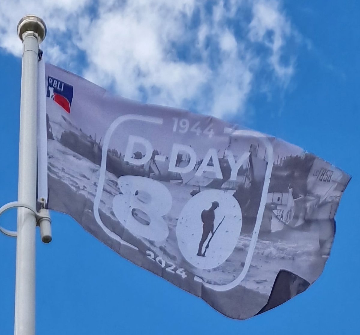 SwantonChairman's tweet photo. We have raised our Royal British Legion DDay80 flag and placed 80 knitted poppies courtesy of Dereham Crafters. Please do join us on the village green at 9.15pm tomorrow for the lighting of our village beacon
#DDay80 #DDay #RBL 
#wewillrememberthem https://t.co/9YaLWnE2eZ