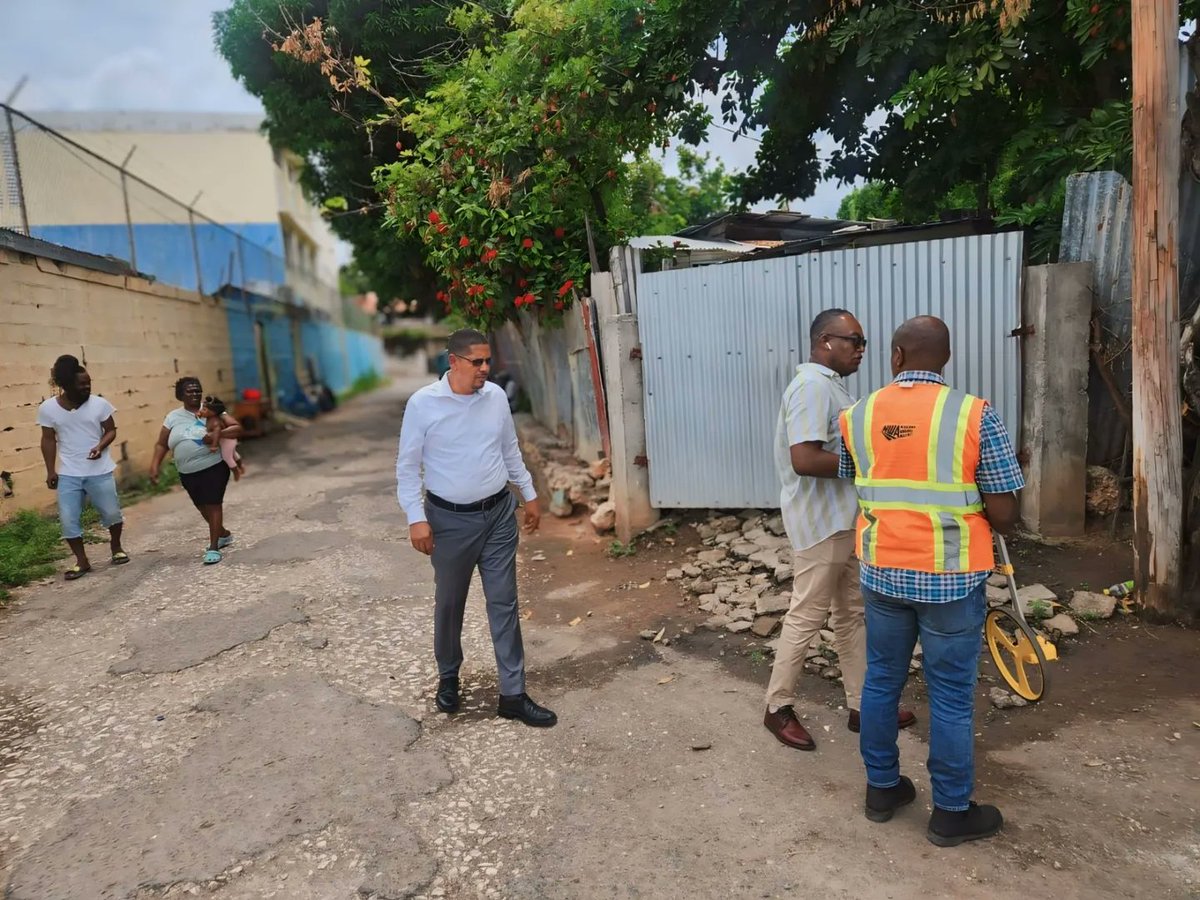DWilliams_Ja's tweet photo. Pleased to announce that work will commence on the rehabilitation of St. Michaels Lane (Raetown) and Regent Street (Allman Town) under a previously approved road repair program. I was delighted to join the team from the #NWA during their visit. #Impact #CentralKingston https://t.co/x5VML89HuQ