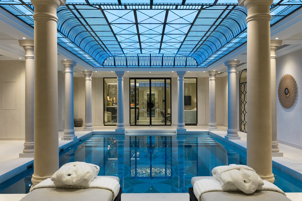 This Grade I Listed Property features a charming garden terrace and a stunning Roman-style pool, seamlessly blending historic charm with modern luxury.

#shhlondon #residential #familyhome #contrasts #massing #architecture #pool #lighting #outdoorlighting #luxuryproperty