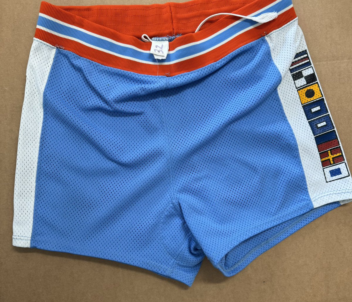 TimGall13's tweet photo. Today's Treasure from my collection: These original late 1970's NBA San Diego Clippers shorts made their way to me some years ago. They are Russell Athletic size 36 with # 32 (# worn only by Bob Bigelow &amp; then later Bill Walton) on the tag. The nautical flags spell out CLIPPERS. https://t.co/7DRaKiTe4P