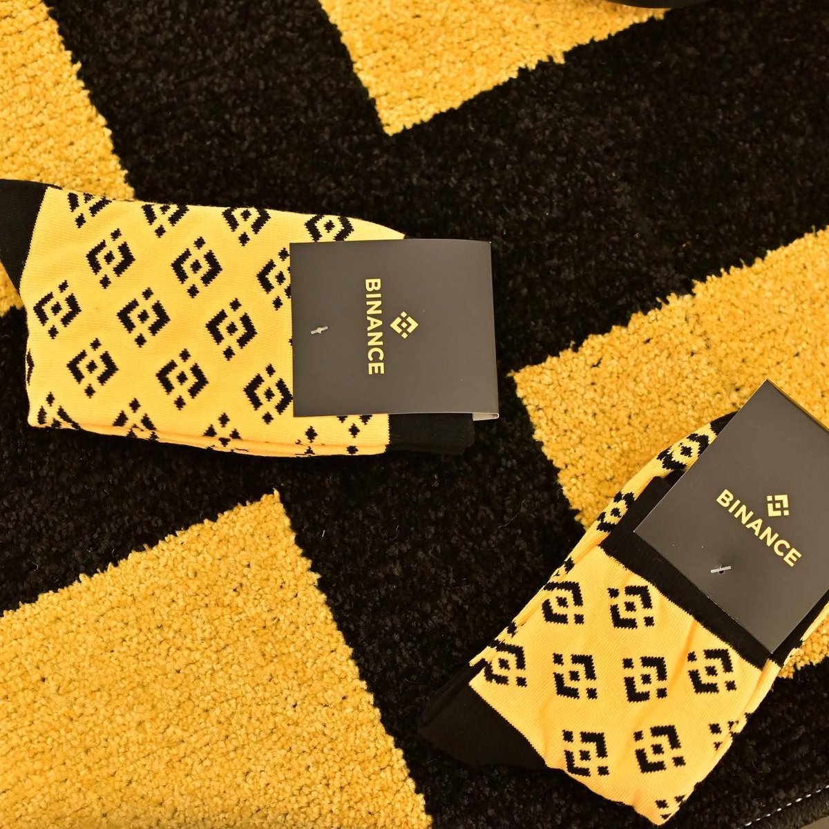 binance's tweet photo. Is your outfit complete without #Binance socks? https://t.co/M2SPmpd4F8