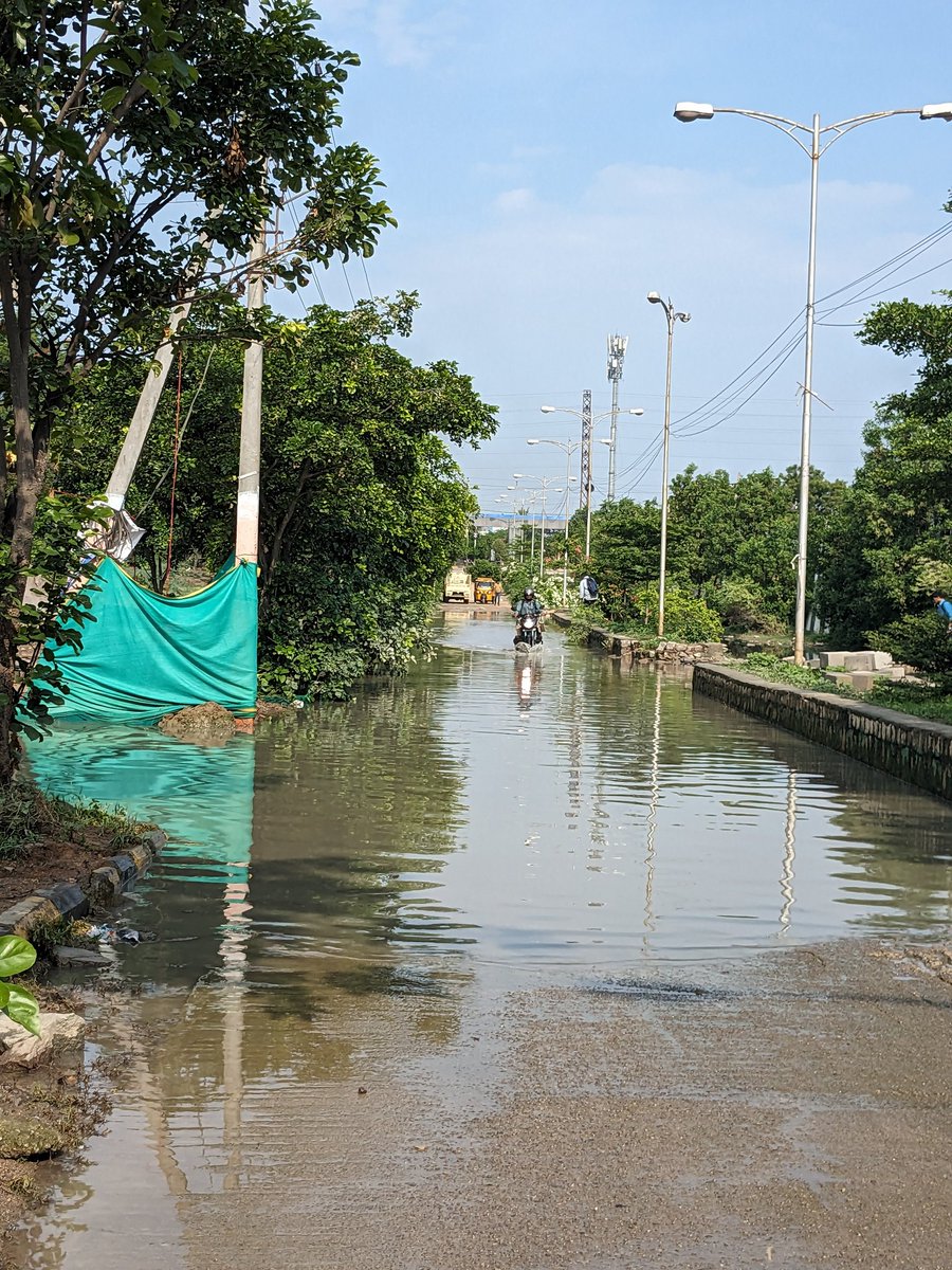 TheTweetOfMAD's tweet photo. @GHMCOnline @CommissionrGHMC @HMWSSBOnline Rain water locked on the road from last 10 days near Tulasi Lakefront, Suraram. People facing lot of trouble while going through this road. Requesting to take action. The water logging may lead to harmful diseases. https://t.co/1jynQrhEnY
