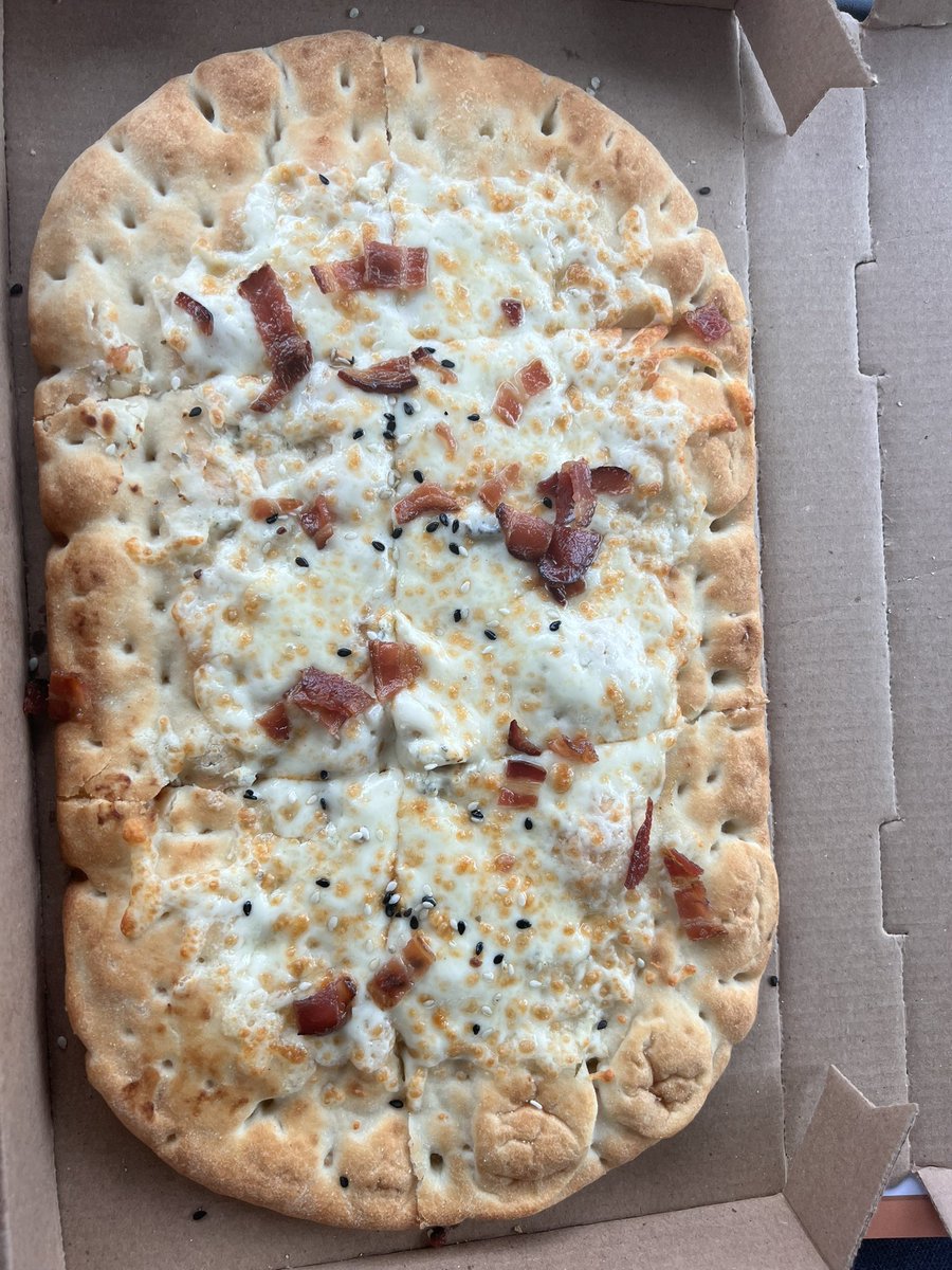 omalley_dave's tweet photo. Ordered my 1st pizza  @TimHortons. This is from the Lindsay Stop on Hwy. 35 Bacon everything? There’s not even a full piece of bacon on this thing. Had I known “everything” meant 34 little seeds (no, I didn’t count. Just a guess) I would not have ordered this. 
#disappointment https://t.co/N5RkTgVwv8