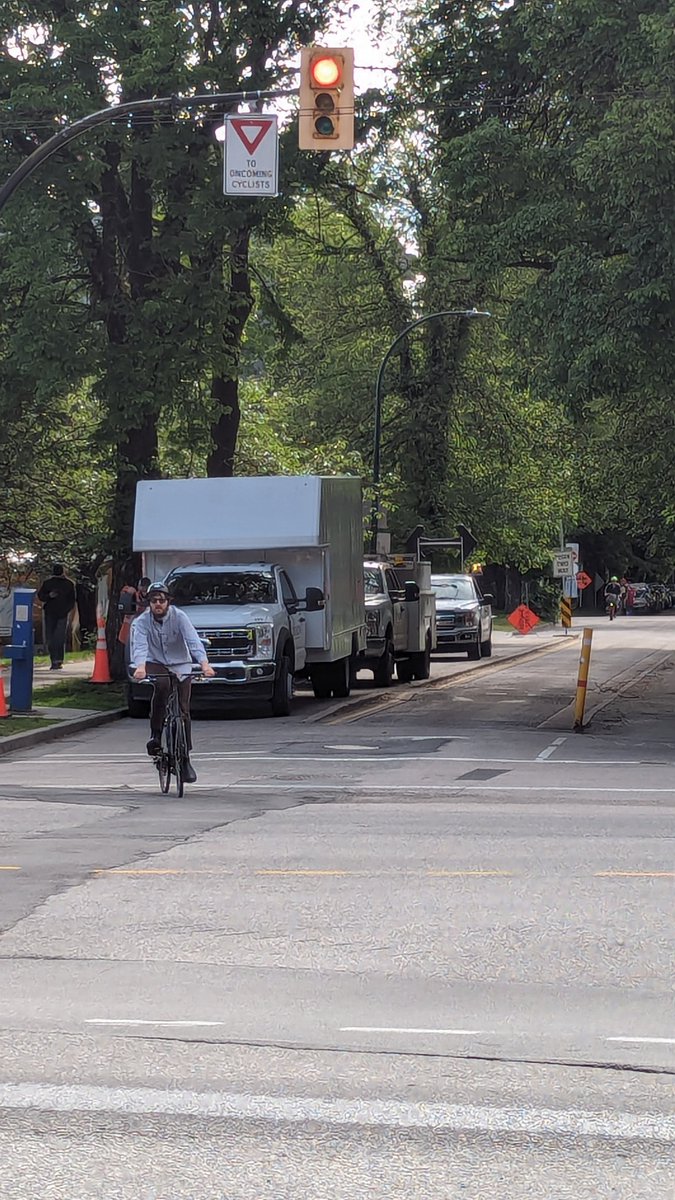 spokesmama's tweet photo. Hey @CityofVancouver for two days now there's been work trucks blocking the separated bike lane on 10th just north of City Hall. Need to close the middle lane so cyclists can get through safely! #GBBW https://t.co/euRuYPQMTd