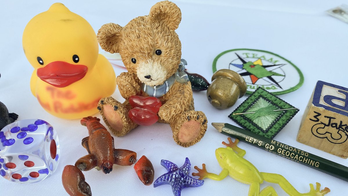 landsharkz's tweet photo. Geocaching signature items are unique tokens left by geocachers to mark their visit and share their identity. From personal tokens to handmade keychains, they add a personal touch to geocaching. Collecting them creates lasting memories and connections. Trade fairly! #Geocaching https://t.co/mSk2Hc3Avc