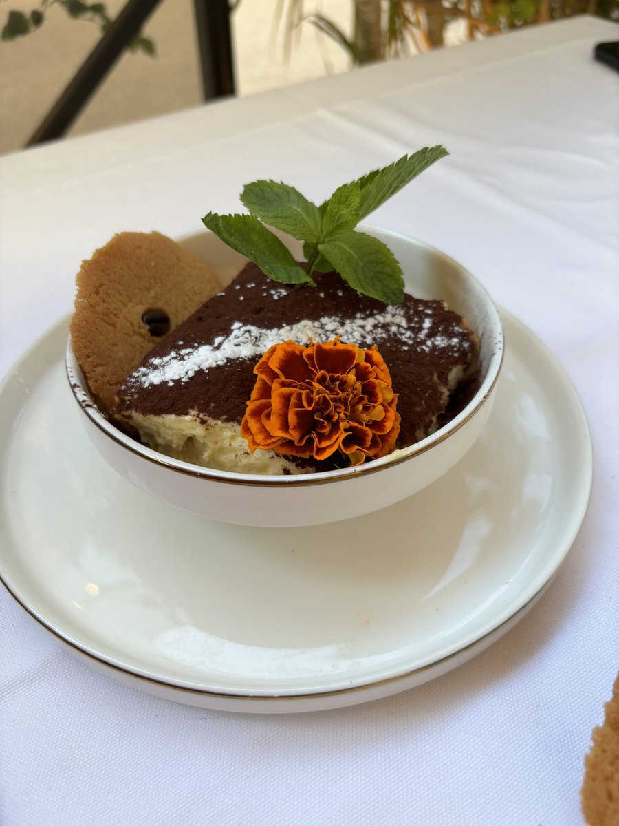 To a wonderful vacation in Italy, I decided to end it with a traditional Italian meal. I had potato gnocchi and for dessert a cappuccino with tiramisu