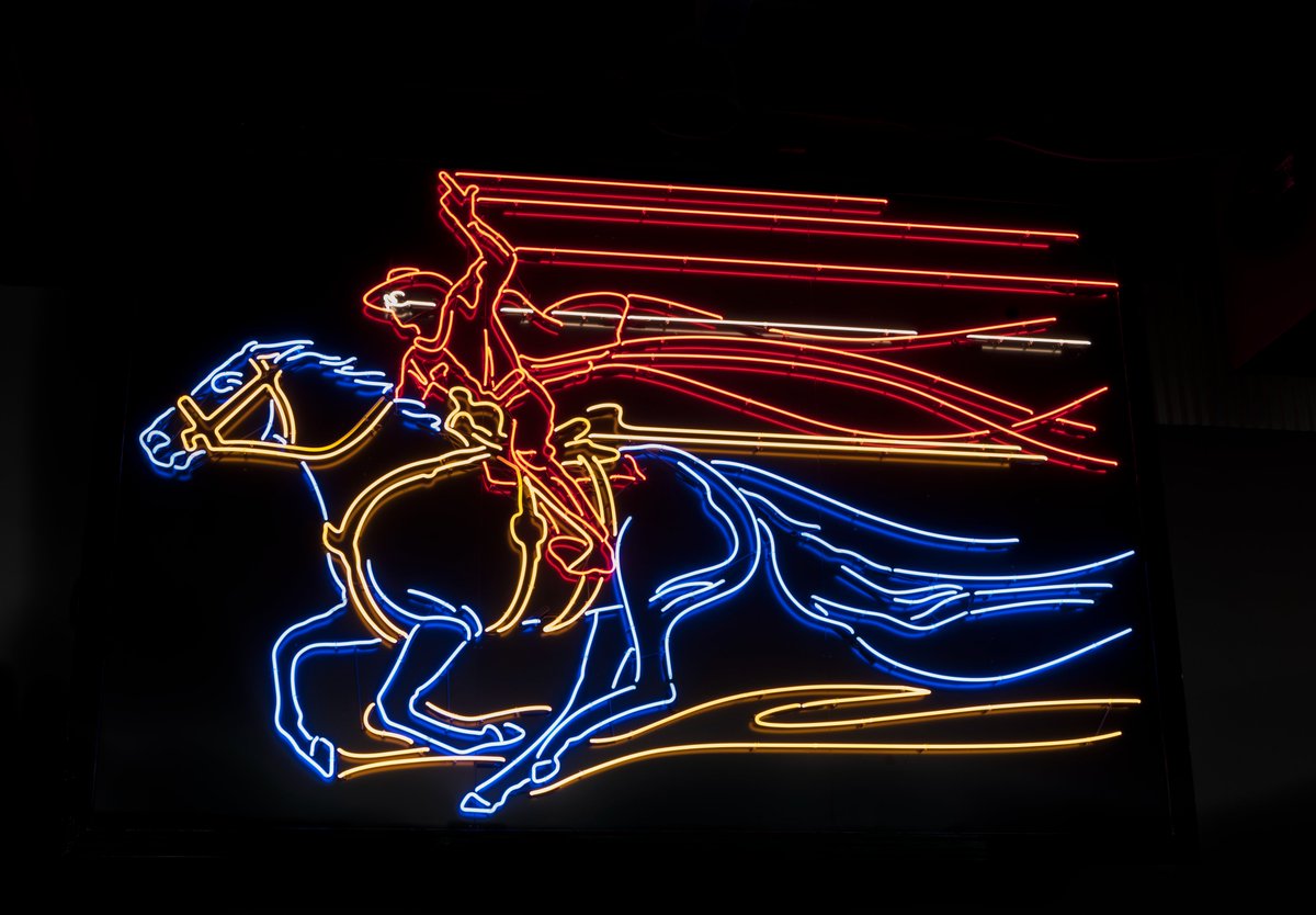 Tony Greer’s piece “Illuminated Rider” is located Inside the North End Zone club at TTU’s Jones AT&amp;T football stadium. This neon piece highlights the art and science of illumination and showcases the Masked Rider. #arttrek #ttuspublicart
