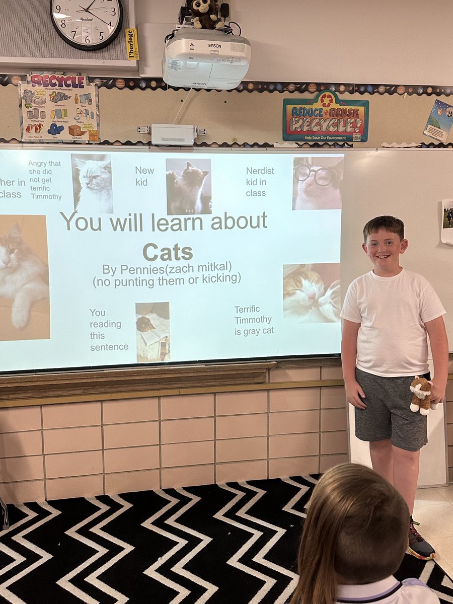 Zach presenting his passion project on cats. #engaged64