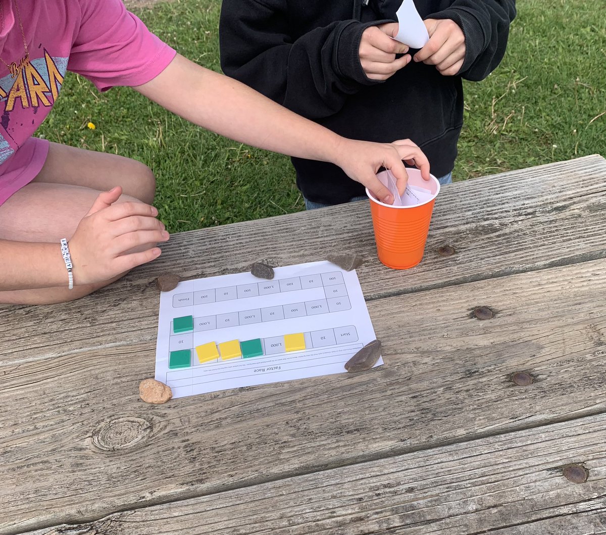 macphee_maggie's tweet photo. It was a little windy but this group came up with the plan for doing math outside anyway (with some help from some rocks)!! #iteachmath #ccrcemath #outdoorlearning https://t.co/LzArkF8mQS