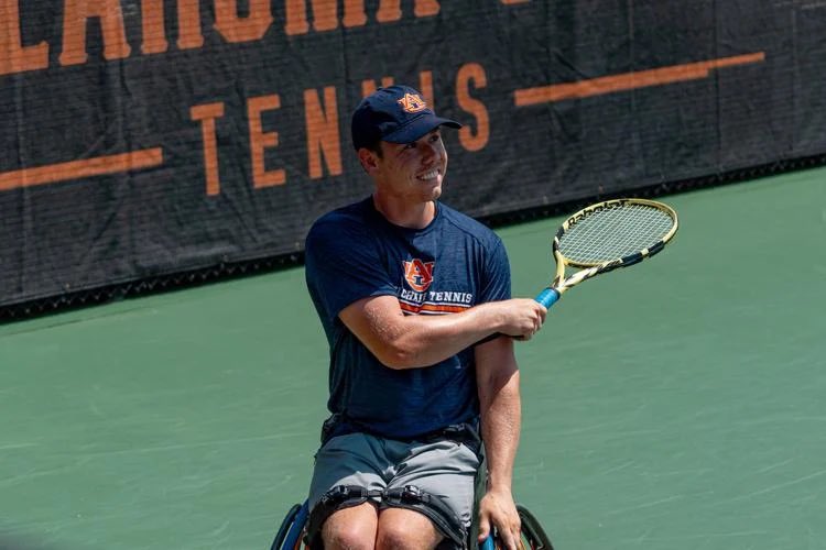 JacobWaters_'s tweet photo. Auburn University student Gabe Puthoff was born with a disability called spinal bifida, a birth defect where an area of the spinal column doesn’t form properly — but that never stopped him from playing sports.

Both his parents and his older brother played sports, so Gabe wanted to get in on the action too.

Eventually, he got to Auburn where he played wheelchair tennis and wheelchair basketball, and last week, he represented Auburn in the wheelchair tennis national championship — taking down Alabama in the Final Four to get there.

📰: https://t.co/ghMPv9EJj3
📸: @ITA_Tennis, @LeahBwolf