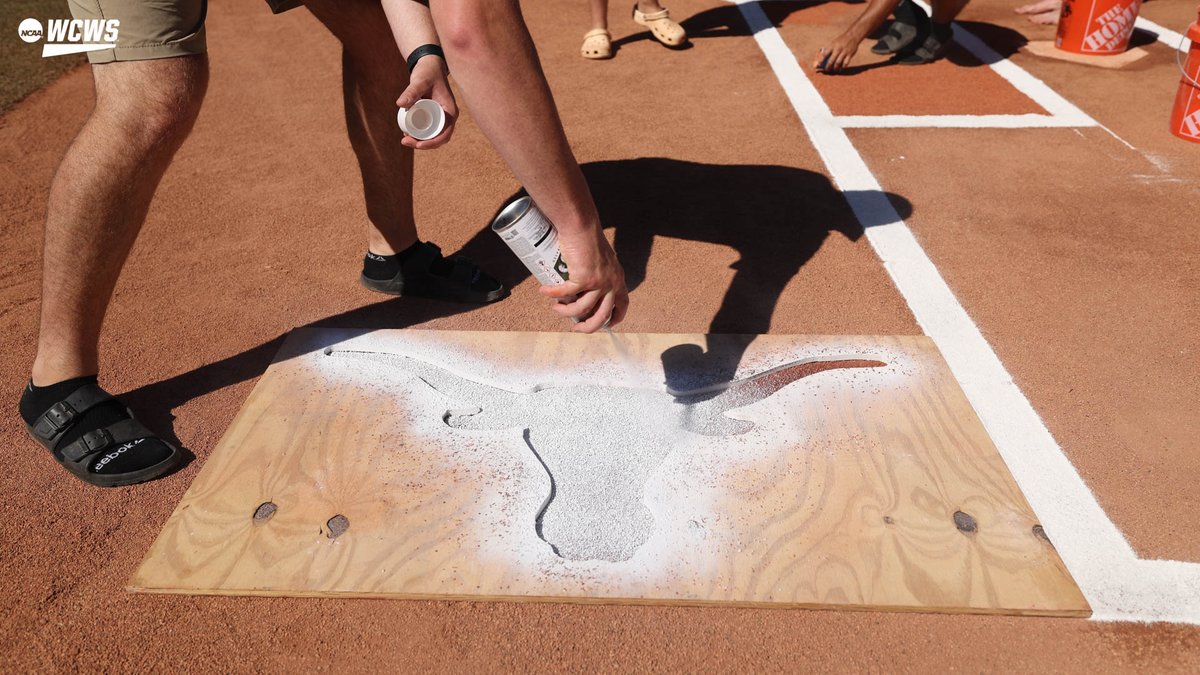 NCAASoftball's tweet photo. The finishing touches 🖌️

#WCWS https://t.co/8uahupWyhE