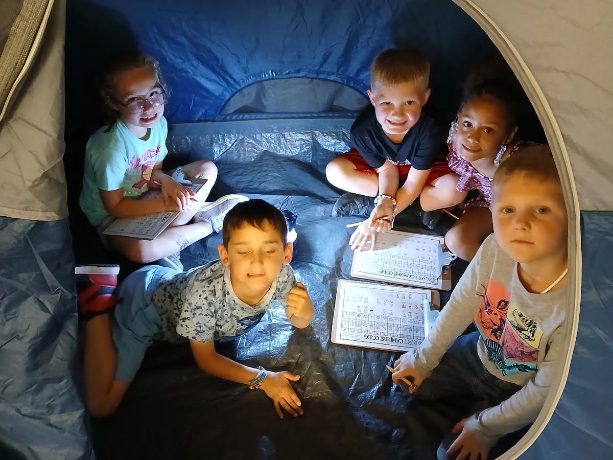 IndianaAreaSD's tweet photo. 🌟 Our 1st and 2nd graders are having a blast at Camp Learn-A-Lot! ⛺️ They're making memories in their tents, enjoying flashlight reading under the stars, and roasting s'mores by the campfire. 🏕️ Who knew learning could be this much fun? #HappyCampers #SmoreFun #proudBFprincipal https://t.co/gswGpXEtPZ