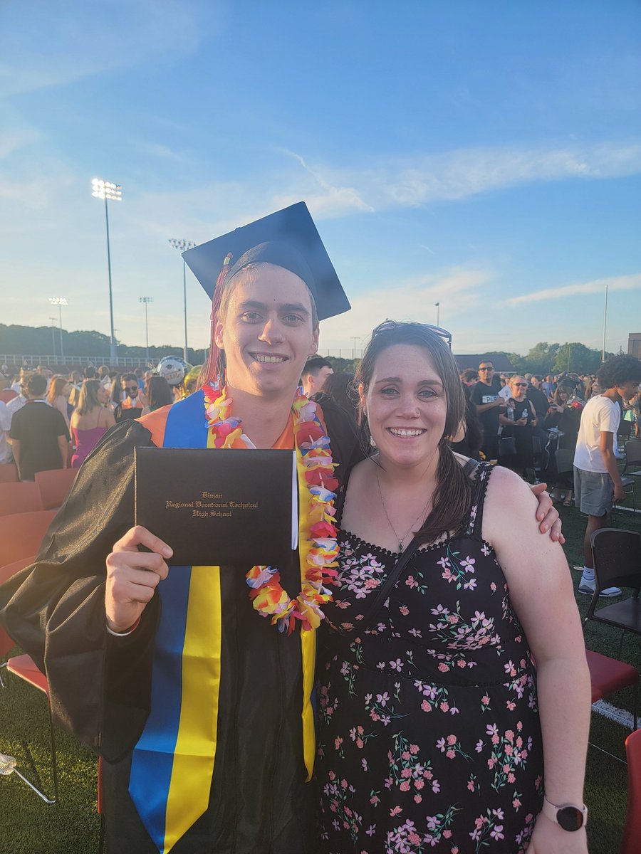 NAFOteacher's tweet photo. Olek graduated from the high school I teach at this evening. I was able to hand him his diploma! I'm so incredibly proud of him 🥹 he's off to college in the Fall to study Computer Science &amp; Cybersecurity. He's made Ukraine proud 🇺🇦 https://t.co/O2zT0Uwvft