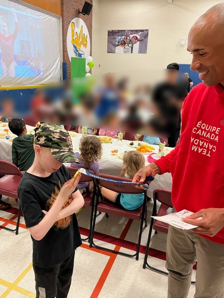 GrtDot5F's tweet photo. How many of us have the chance to hold an Olympic Gold Medal?
Feel the weight of it?
Run your fingers over the surface of it?

You're a true gentleman, Mr. Warner. Thank-you for your kindness and taking the time to make sure my students got everything they could from your visit. https://t.co/O9bOJThRgs