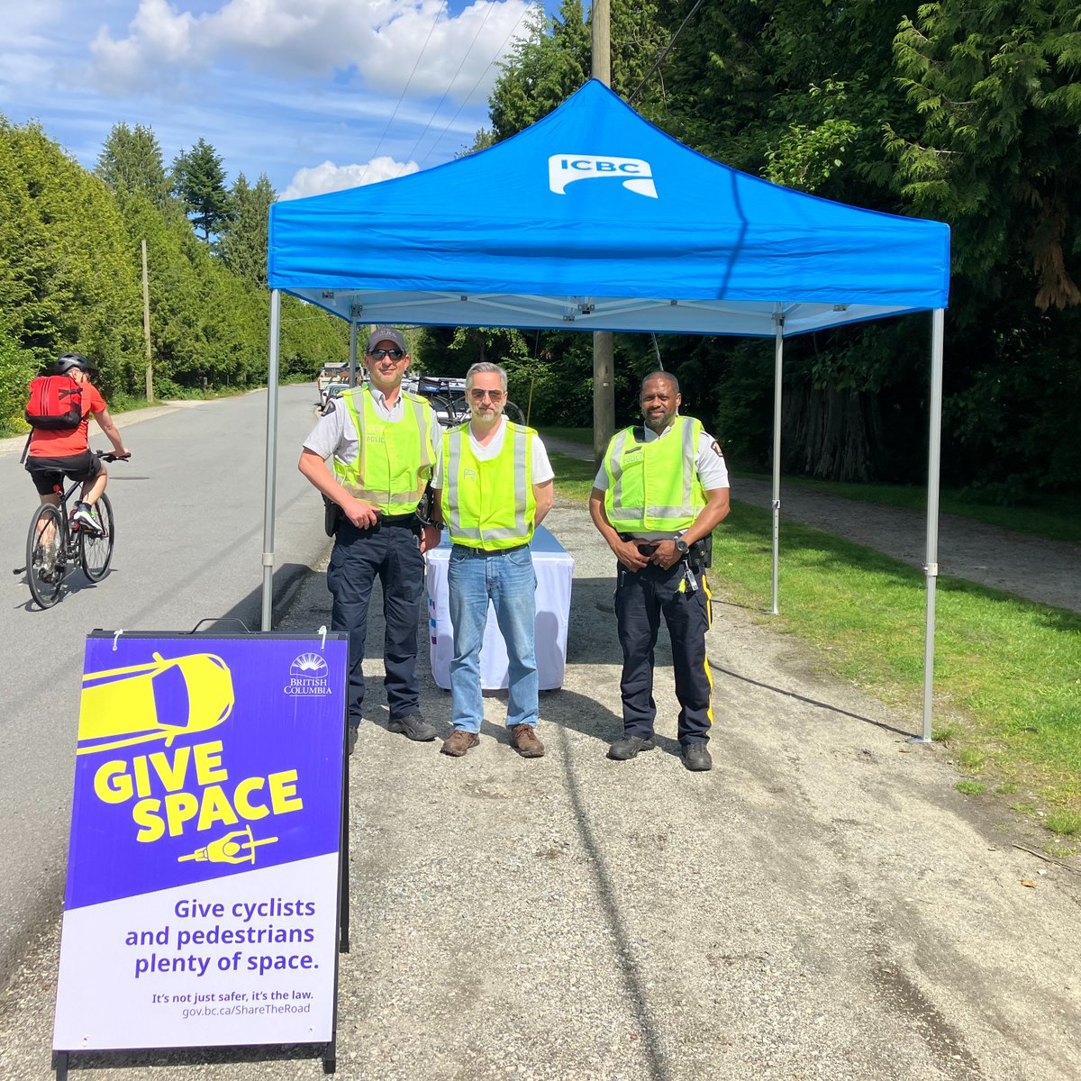 We are here on Frances St @ Holdom to remind drivers to keep a safe distance when passing cyclists. 🚴‍♀️ Maintain a 1 meter distance under 50kmh and 1.5 meters over 50kmh when passing a cyclist.  #ShareTheRoadBC <a href="/BurnabyRCMP/">Burnaby RCMP</a> <a href="/icbc/">ICBC</a>