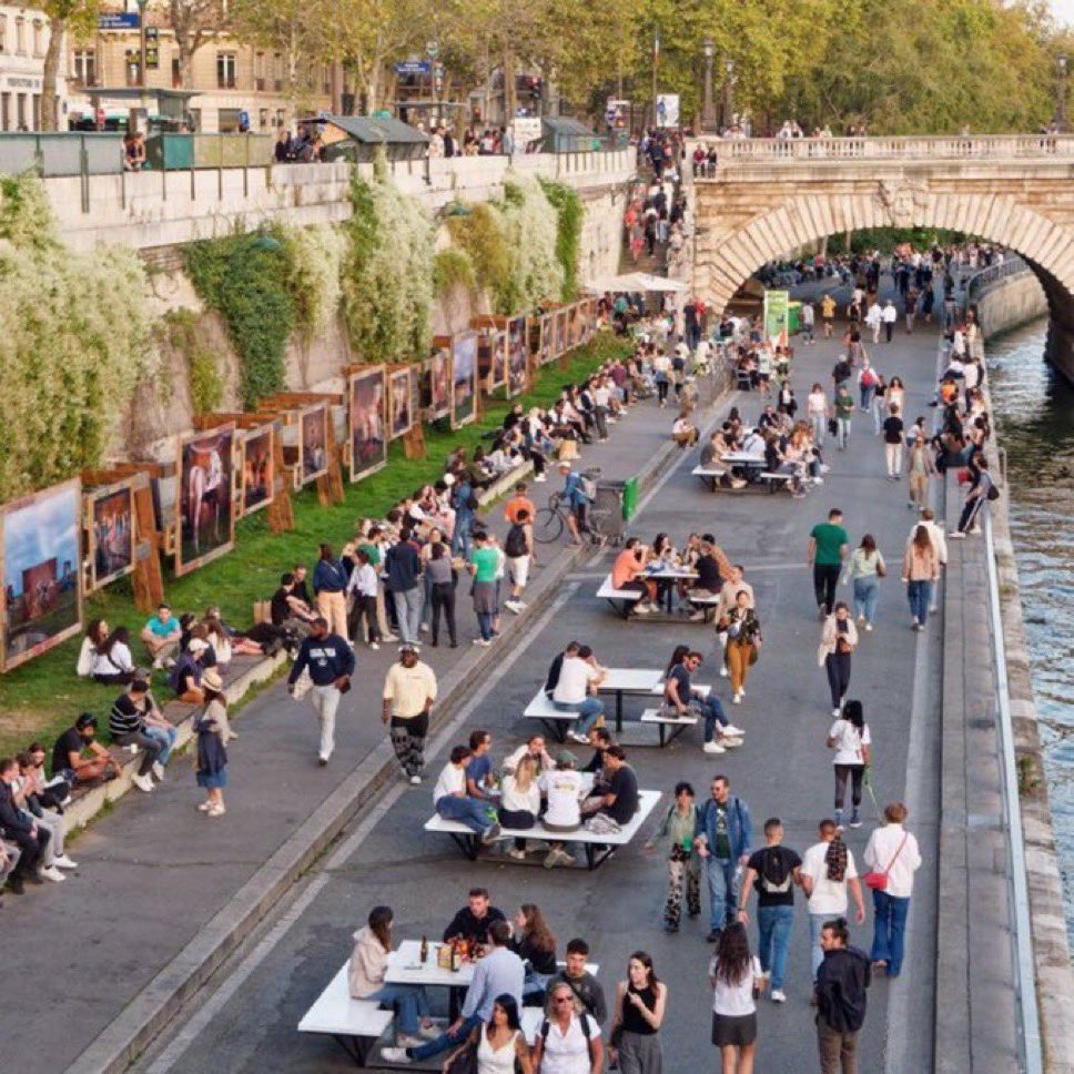 The bank of the Seine in Paris. This used to be surrendered space for cars. For several years now it’s been a special place for people. All it took was leadership. Including fighting and winning a court battle when that leadership was challenged. HT <a href="/EmmanuelSPV/">Emmanuel</a> for the great pic