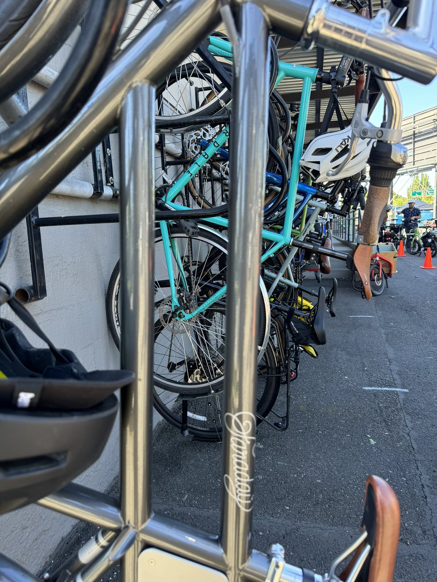 ErnestoPDX's tweet photo. Today I rode my e-bike (thank you @thestreettrust ride2own program) to the Oregon Active Transportation Summit #OATS2024, got to feel like I was in Amsterdam (because of the bike parking), and then got to bike home with these beautiful views. #GoodDay https://t.co/Be4LV4IEHN