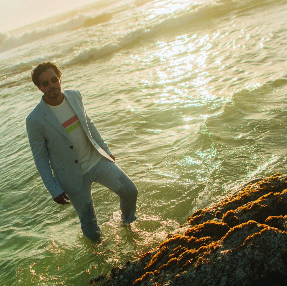 Satirist Noel Coward sang "Mad dogs and Englishmen go out in the midday sun"...they can also be seen strolling through the sea wearing a 2 piece suit at sundown, either or!!

📷 @jimiherrtage  
Model - @luc.delamotte