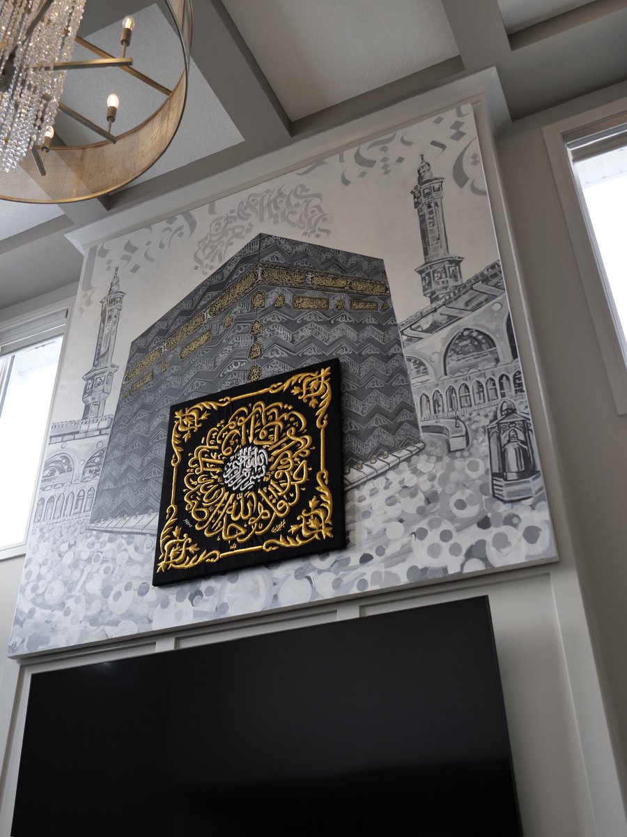Made an 8 foot painting of the Kaaba, with a real piece of the Kiswah on it