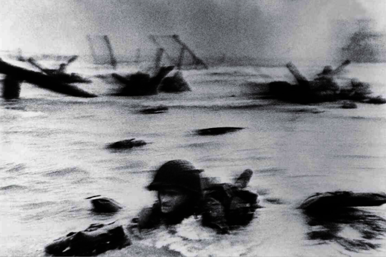 The famed wartime photographer Robert Capa took this harrowing image of young Americans trying make it ashore. And to think that there are some among us today who thought that wearing a mask during the pandemic was too much of a sacrifice to bear