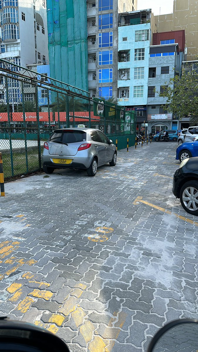 Archad_'s tweet photo. @MaleCitymv over two months now ? These 2 vehicles has been using a non parking area for permanent parking ! It seems nothing can be done . What’s the use of paying a vehicle parking fee ? https://t.co/Da70mW0PcB