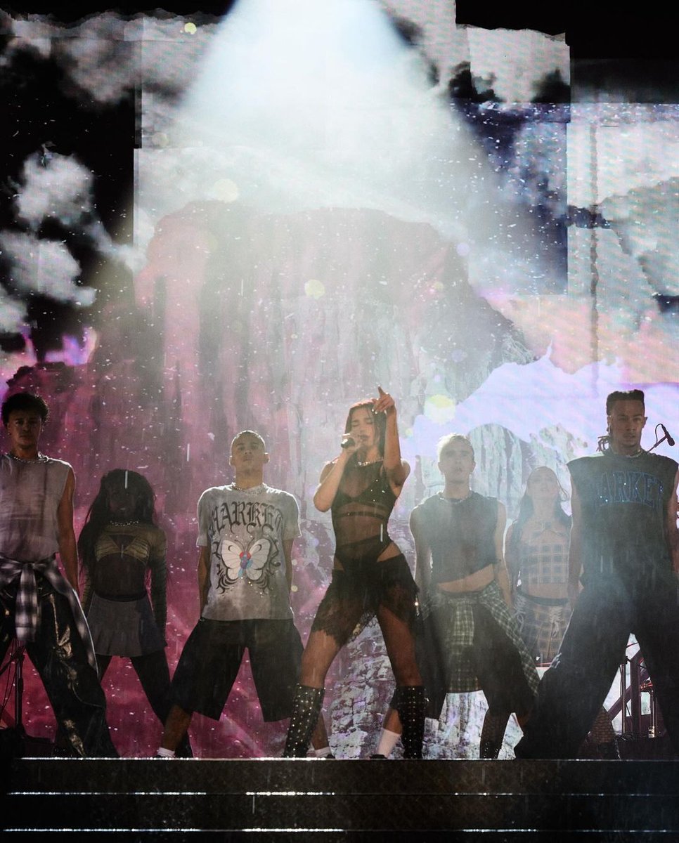 DUALIPA's tweet photo. wow what a kickstart to our summer shows... and we're only just warming uppp!!! Thank you Berlin for dancing in the rain with us 🫀🫀🫀🫀🫀🫀 https://t.co/LWHHjDo60e