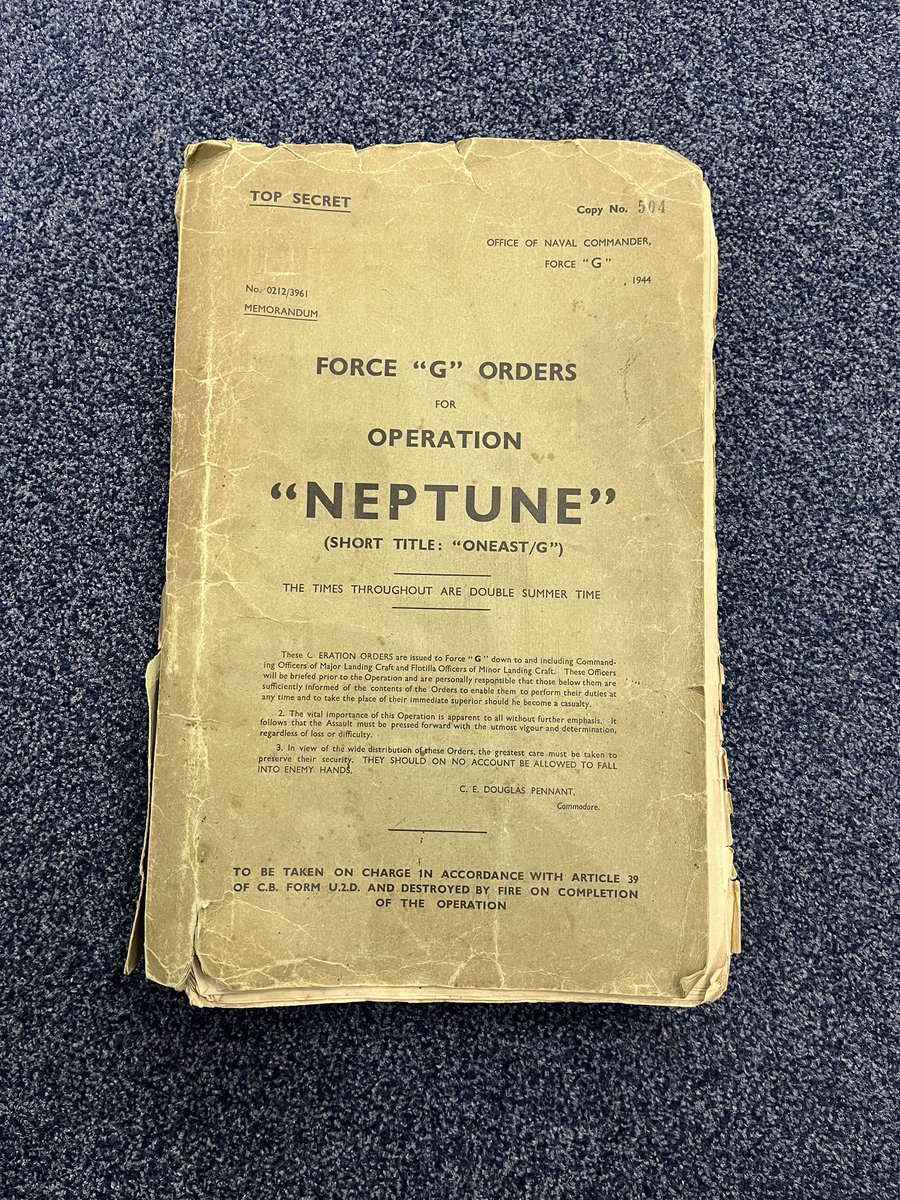 swanseamuseum's tweet photo. Operation Neptune Orders. 
An operation file given to Thomas Hartree Davies, who was in the Royal Navy during the Second World War. The file contains top secret instructions for the landing operations of the Allied invasion of Normandy, France, 6th June 1944. #Dday https://t.co/ojUUmxxoG0
