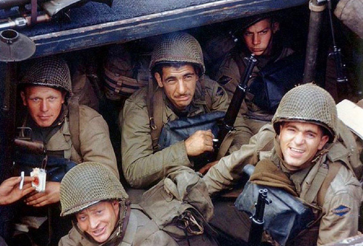 Americans preparing to fight for freedom on D-Day 1944. Sgt. Sandy Martin [top left] died on Omaha Beach in France and is buried there.                     #NARA